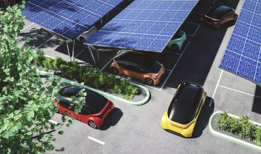 Carros estacionados em um estacionamento com placas solares mostra o uso de  inteligencia artificial sustentabilidade