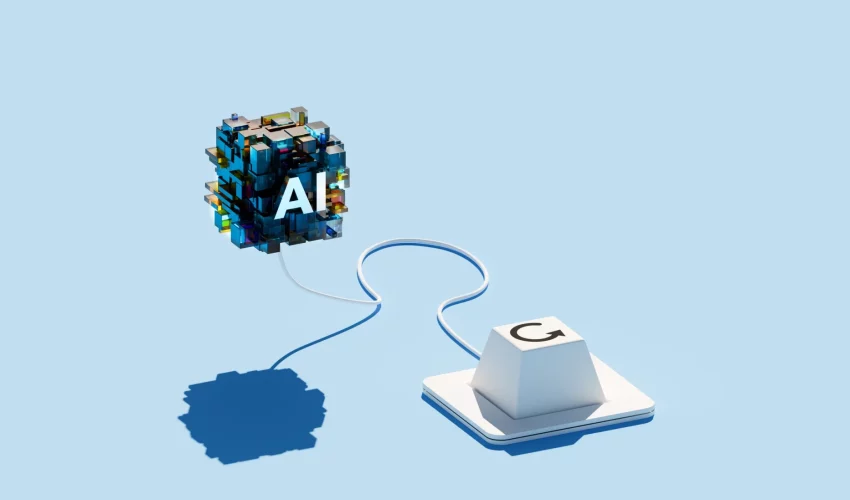 Cubo digital com as letras "AI" conectado por um cabo a uma tecla de computador, sobre fundo azul claro.